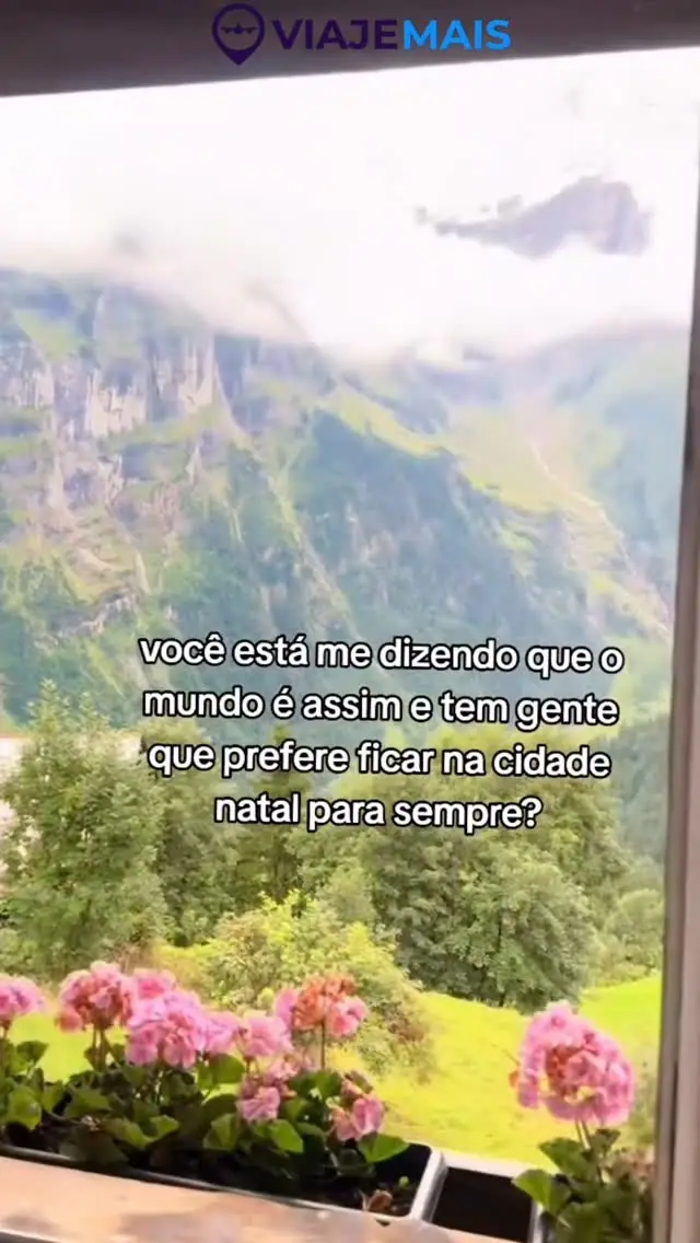 Post: vista de montanhas pela janela do trem